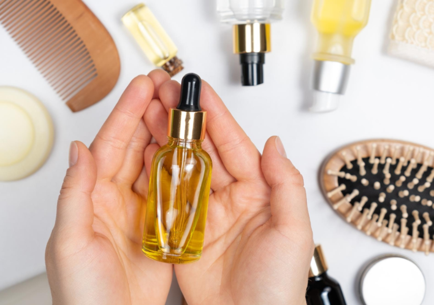 Woman Hands Holding a Face Serum