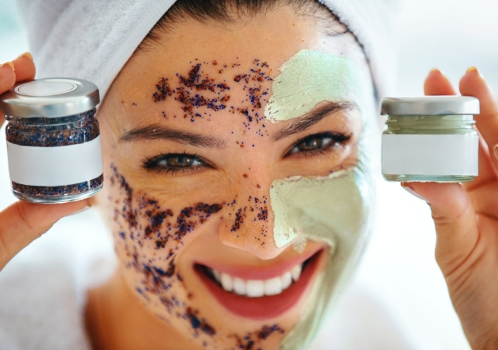 Smiling Woman with Two Exfoliate over Face